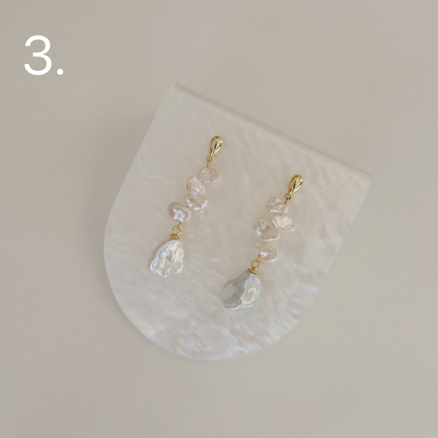 Flores Pearl Dangle Earrings