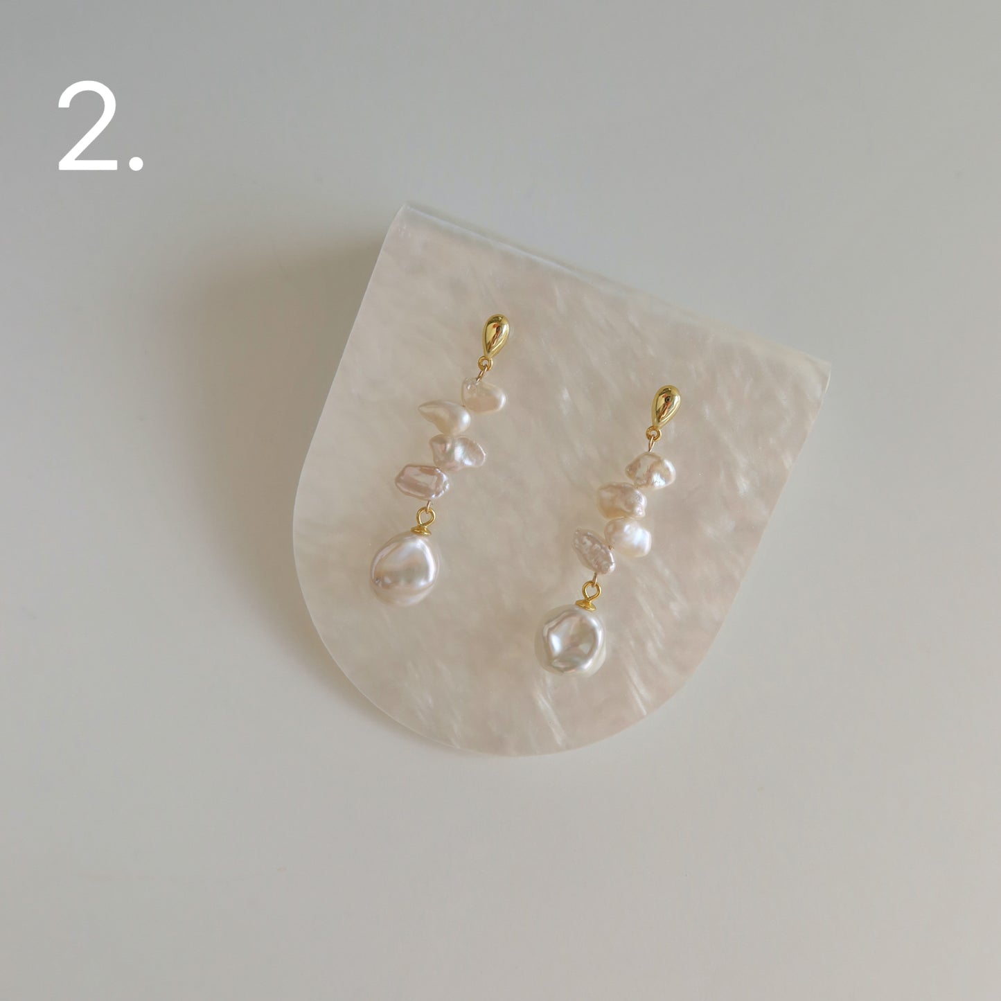 Flores Pearl Dangle Earrings