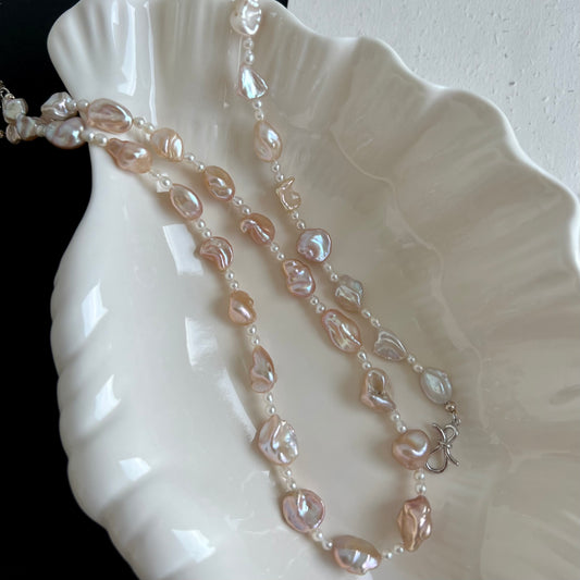 蛇形链上漂浮珍珠项链