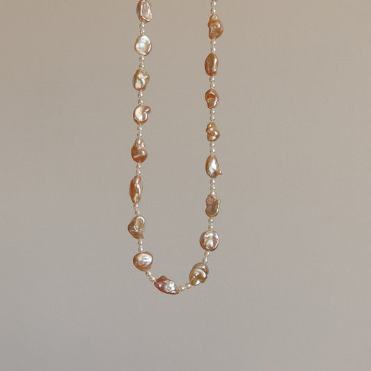 蛇形链上漂浮珍珠项链