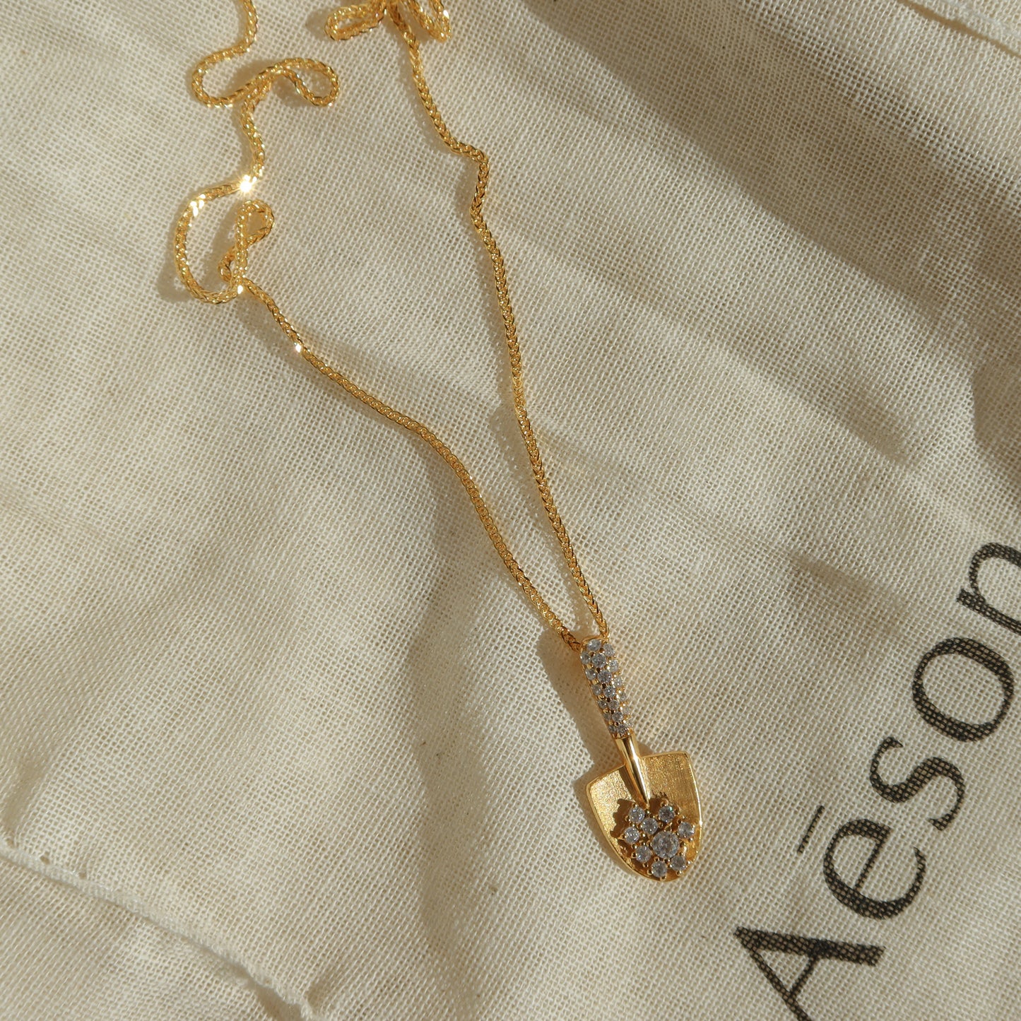Golden Shovel Necklaces