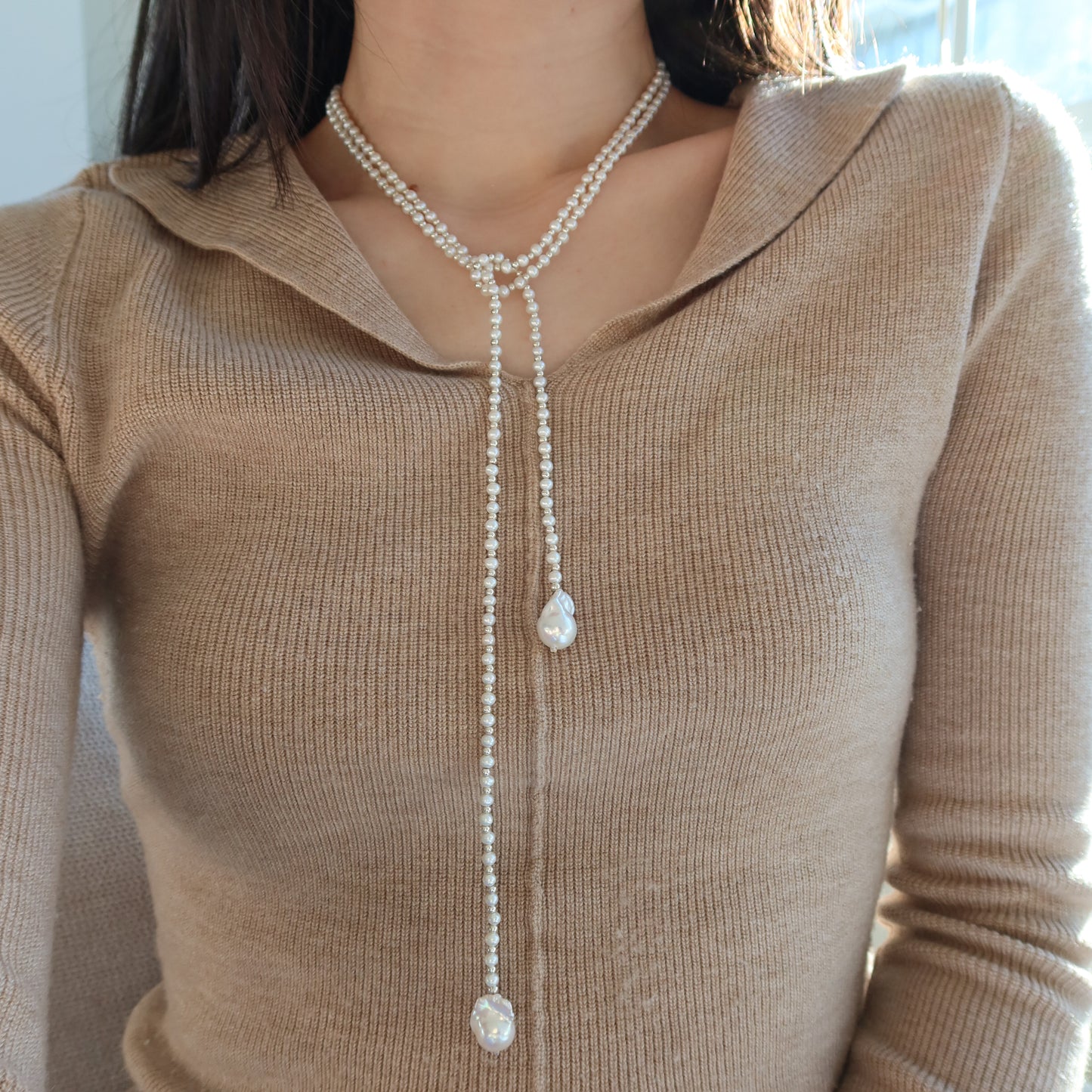 蛇形链上漂浮珍珠项链