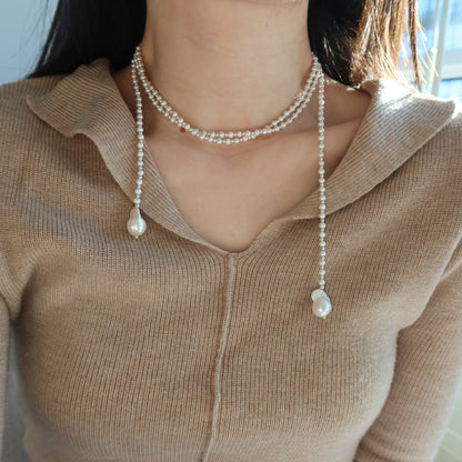 蛇形链上漂浮珍珠项链