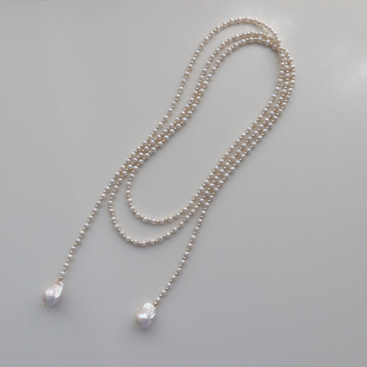 蛇形链上漂浮珍珠项链
