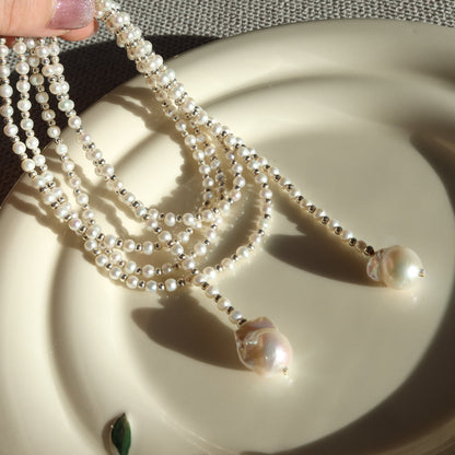 蛇形链上漂浮珍珠项链