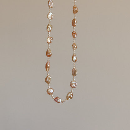 蛇形链上漂浮珍珠项链