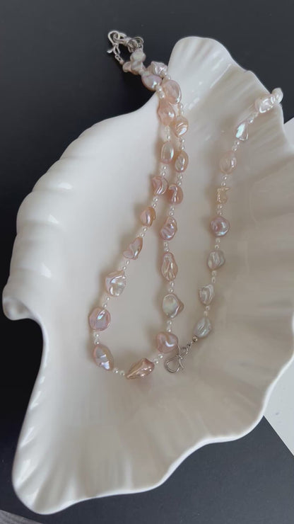 蛇形链上漂浮珍珠项链